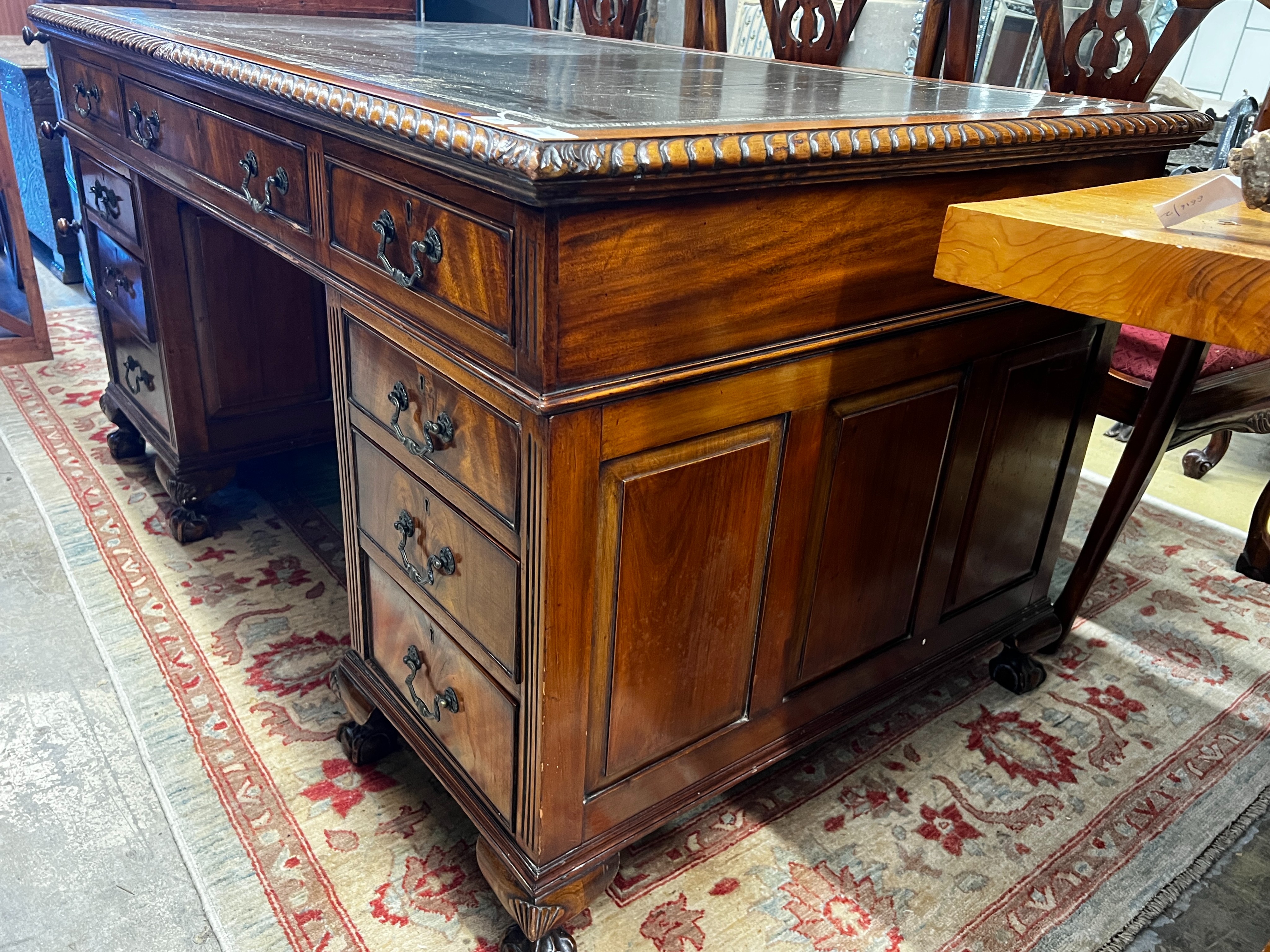 An early 20th century George III style mahogany pedestal desk, length 152cm, depth 91cm, height 81cm